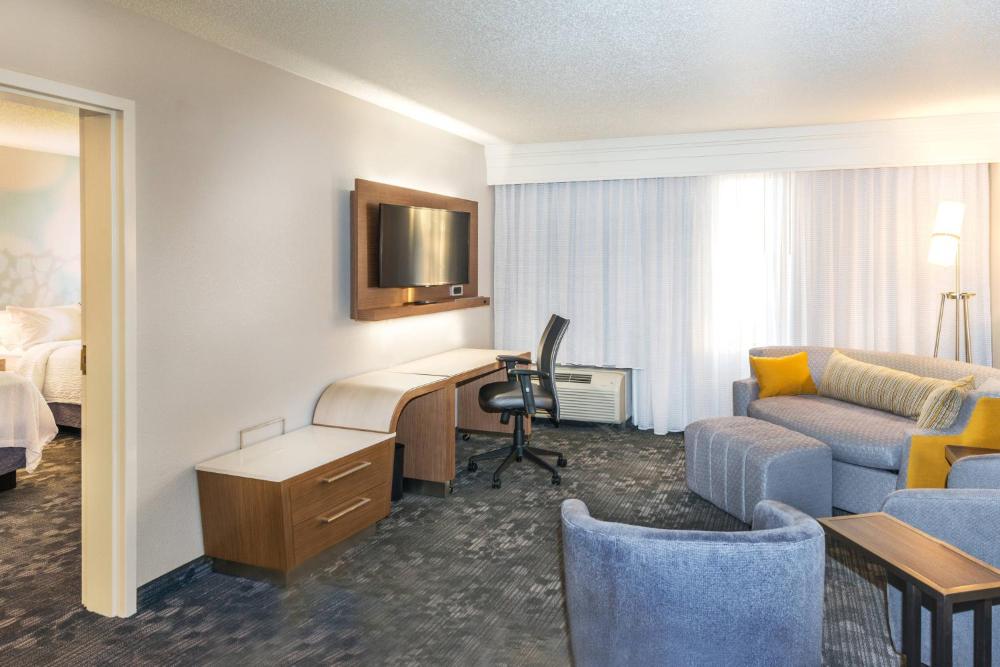 One-Bedroom Suite with Two Double Beds and Sofa Bed interior